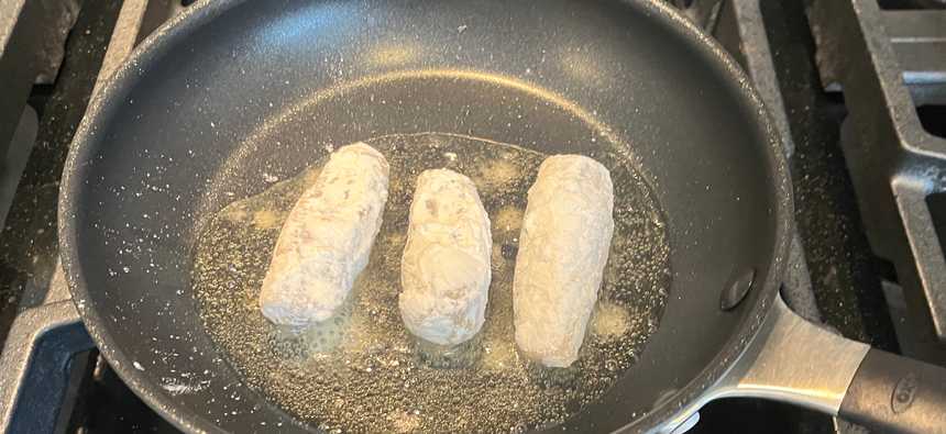 Sardines coated in flour and fried
